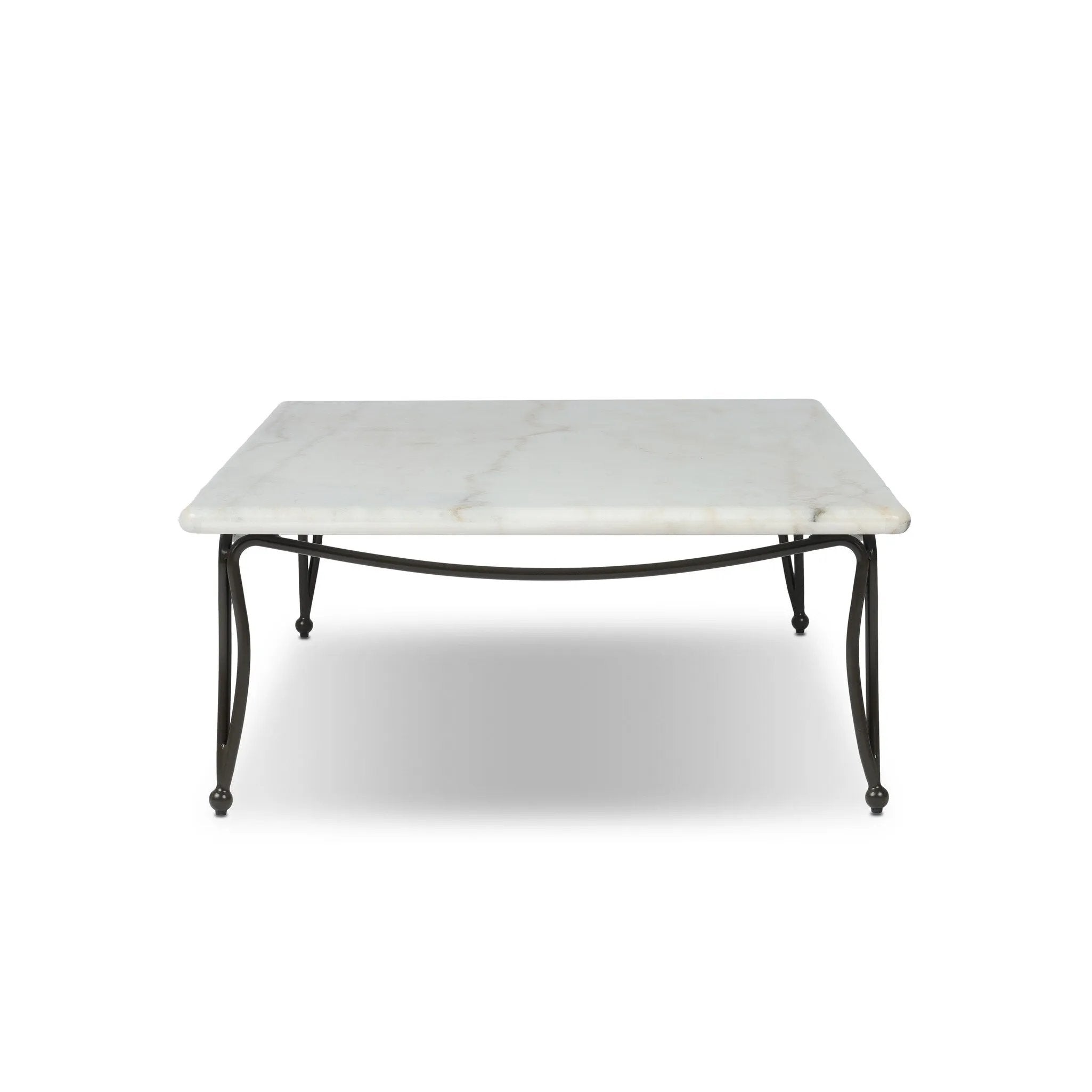 Inspired by Art Deco designs, this outdoor coffee table introduces a sense of movement to a classic silhouette. Graceful, flowing lines on the base pair with a white marble top for a classic black-and-white look. Cover or store inside during inclement weather and when not in use. Amethyst Home provides interior design, new home construction design consulting, vintage area rugs, and lighting in the Boston metro area.