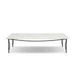 Inspired by Art Deco designs, this outdoor coffee table introduces a sense of movement to a classic silhouette. Graceful, flowing lines on the base pair with a white marble top for a classic black-and-white look. Cover or store inside during inclement weather and when not in use. Amethyst Home provides interior design, new home construction design consulting, vintage area rugs, and lighting in the Miami metro area.