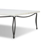 Inspired by Art Deco designs, this outdoor coffee table introduces a sense of movement to a classic silhouette. Graceful, flowing lines on the base pair with a white marble top for a classic black-and-white look. Cover or store inside during inclement weather and when not in use. Amethyst Home provides interior design, new home construction design consulting, vintage area rugs, and lighting in the Park City metro area.