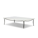 Inspired by Art Deco designs, this outdoor coffee table introduces a sense of movement to a classic silhouette. Graceful, flowing lines on the base pair with a white marble top for a classic black-and-white look. Cover or store inside during inclement weather and when not in use. Amethyst Home provides interior design, new home construction design consulting, vintage area rugs, and lighting in the Seattle metro area.