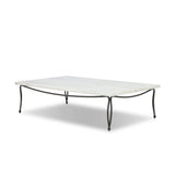 Inspired by Art Deco designs, this outdoor coffee table introduces a sense of movement to a classic silhouette. Graceful, flowing lines on the base pair with a white marble top for a classic black-and-white look. Cover or store inside during inclement weather and when not in use. Amethyst Home provides interior design, new home construction design consulting, vintage area rugs, and lighting in the Seattle metro area.