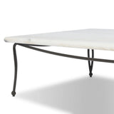 Inspired by Art Deco designs, this outdoor coffee table introduces a sense of movement to a classic silhouette. Graceful, flowing lines on the base pair with a white marble top for a classic black-and-white look. Cover or store inside during inclement weather and when not in use. Amethyst Home provides interior design, new home construction design consulting, vintage area rugs, and lighting in the Washington metro area.