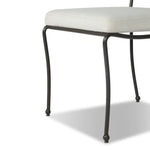 Inspired by Art Deco designs, this outdoor dining chair introduces a sense of movement to a classic silhouette. Subtly curved metal framing, a woven back and upholstered seat cushion craft a thoughtful mix of materials. Cover or store inside during inclement weather and when not in use. Amethyst Home provides interior design, new home construction design consulting, vintage area rugs, and lighting in the Laguna Beach metro area.