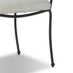 Inspired by Art Deco designs, this outdoor dining chair introduces a sense of movement to a classic silhouette. Subtly curved metal framing, a woven back and upholstered seat cushion craft a thoughtful mix of materials. Cover or store inside during inclement weather and when not in use. Amethyst Home provides interior design, new home construction design consulting, vintage area rugs, and lighting in the Los Angeles metro area.