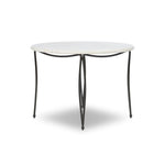 Inspired by Art Deco designs, this outdoor bistro dining table introduces a sense of movement to a classic silhouette. Graceful, flowing lines on the base pair with a white marble top for a classic black-and-white look. Cover or store inside during inclement weather and when not in use. Amethyst Home provides interior design, new home construction design consulting, vintage area rugs, and lighting in the Des Moines metro area.