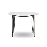 Inspired by Art Deco designs, this outdoor bistro dining table introduces a sense of movement to a classic silhouette. Graceful, flowing lines on the base pair with a white marble top for a classic black-and-white look. Cover or store inside during inclement weather and when not in use. Amethyst Home provides interior design, new home construction design consulting, vintage area rugs, and lighting in the Nashville metro area.