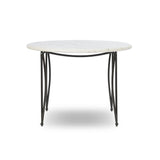 Inspired by Art Deco designs, this outdoor bistro dining table introduces a sense of movement to a classic silhouette. Graceful, flowing lines on the base pair with a white marble top for a classic black-and-white look. Cover or store inside during inclement weather and when not in use. Amethyst Home provides interior design, new home construction design consulting, vintage area rugs, and lighting in the Nashville metro area.