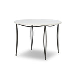 Inspired by Art Deco designs, this outdoor bistro dining table introduces a sense of movement to a classic silhouette. Graceful, flowing lines on the base pair with a white marble top for a classic black-and-white look. Cover or store inside during inclement weather and when not in use. Amethyst Home provides interior design, new home construction design consulting, vintage area rugs, and lighting in the Seattle metro area.