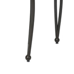 Inspired by Art Deco designs, this outdoor end table introduces a sense of movement to a classic silhouette. Graceful, flowing lines on the base pair with a white marble top for a classic black-and-white look. Cover or store inside during inclement weather and when not in use. Amethyst Home provides interior design, new home construction design consulting, vintage area rugs, and lighting in the Laguna Beach metro area.