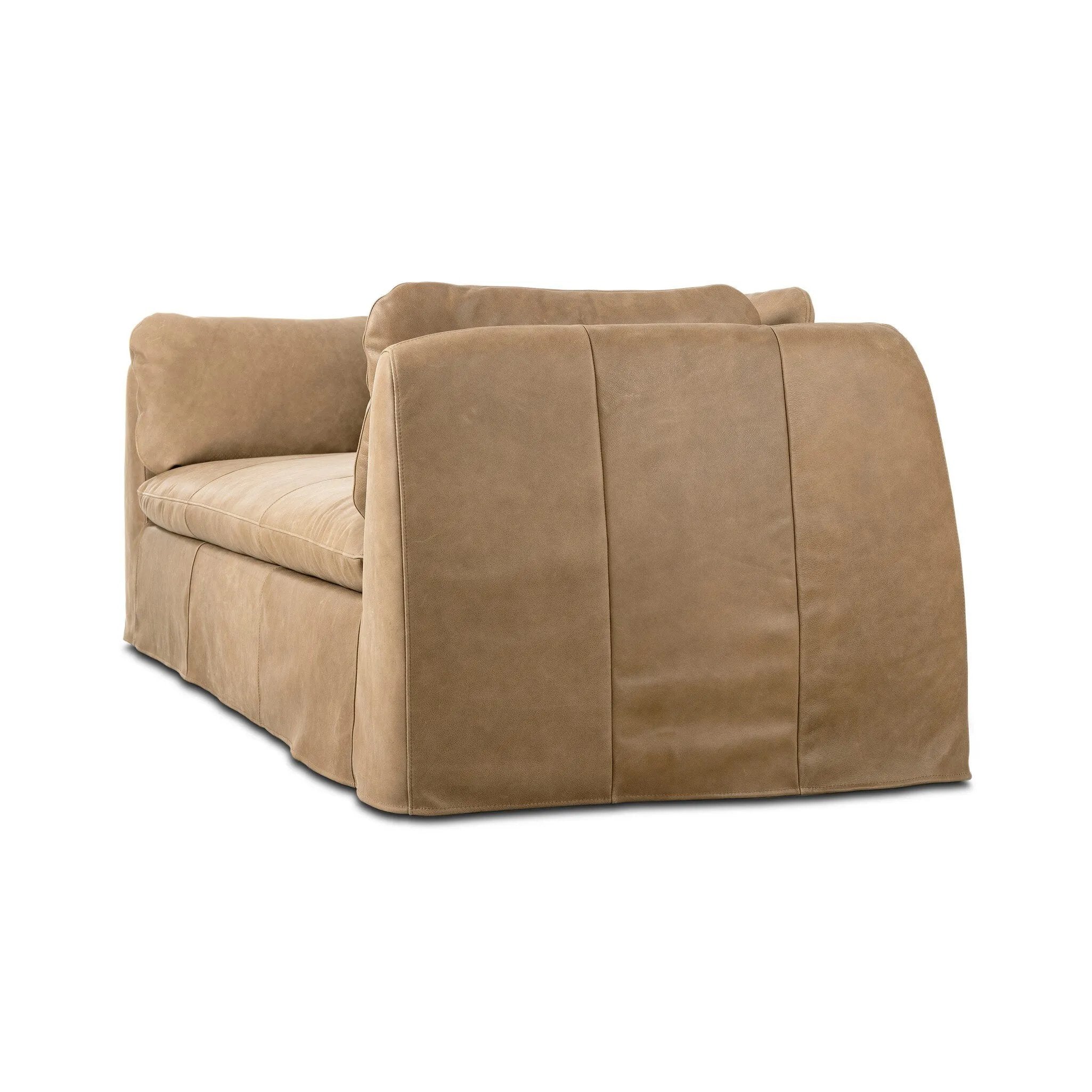 Elevate your everyday with a luxurious twist on the slipcovered sofa. Rich top-grain leather covers wide arms, tapered framing and knife-edge cushioning designed for comfort. Slipcover fully removable Amethyst Home provides interior design, new home construction design consulting, vintage area rugs, and lighting in the Newport Beach metro area.