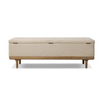 Wrapped in textural cream performance fabric, this spacious trunk doubles as seating at the foot of the bed — or anywhere. Store extra blankets, linens and more. Crafted from oak, the frame and tapered legs with Deco vibes are finished in a worn oak finish. Amethyst Home provides interior design, new home construction design consulting, vintage area rugs, and lighting in the Boston metro area.