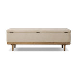 Wrapped in textural cream performance fabric, this spacious trunk doubles as seating at the foot of the bed — or anywhere. Store extra blankets, linens and more. Crafted from oak, the frame and tapered legs with Deco vibes are finished in a worn oak finish. Amethyst Home provides interior design, new home construction design consulting, vintage area rugs, and lighting in the Boston metro area.