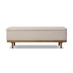 Wrapped in textural cream performance fabric, this spacious trunk doubles as seating at the foot of the bed — or anywhere. Store extra blankets, linens and more. Crafted from oak, the frame and tapered legs with Deco vibes are finished in a worn oak finish. Amethyst Home provides interior design, new home construction design consulting, vintage area rugs, and lighting in the Washington metro area.