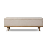 Wrapped in textural cream performance fabric, this spacious trunk doubles as seating at the foot of the bed — or anywhere. Store extra blankets, linens and more. Crafted from oak, the frame and tapered legs with Deco vibes are finished in a worn oak finish. Amethyst Home provides interior design, new home construction design consulting, vintage area rugs, and lighting in the Washington metro area.
