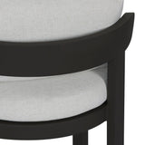 Crisp upholstery and metal framing form a simple barrel back outdoor dining chair, complemented by softened edges and a fluid shape for a classic look. Cover or store inside during inclement weather and when not in use. Amethyst Home provides interior design, new home construction design consulting, vintage area rugs, and lighting in the Boston metro area.