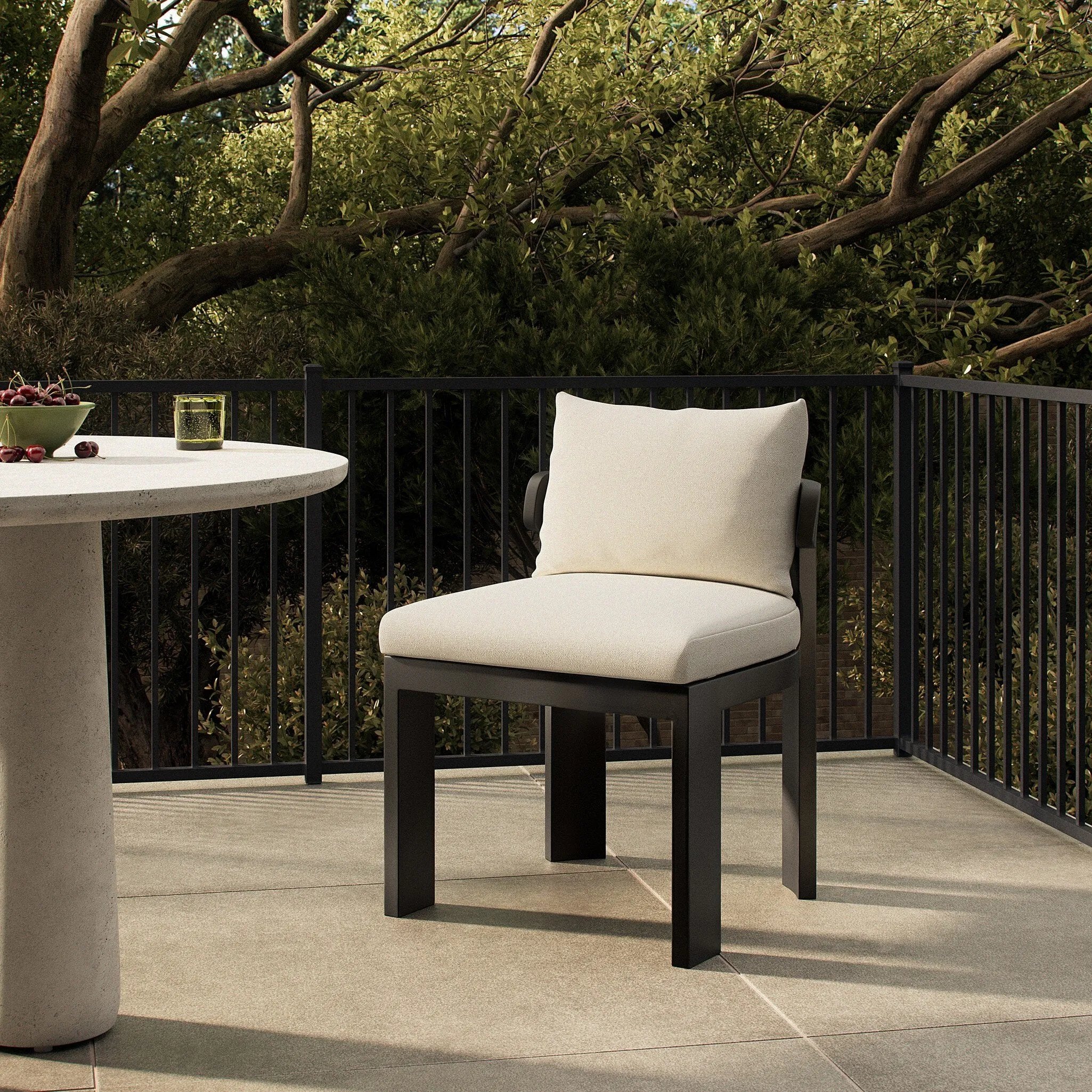 Crisp upholstery and metal framing form a simple barrel back outdoor dining chair, complemented by softened edges and a fluid shape for a classic look. Cover or store inside during inclement weather and when not in use. Amethyst Home provides interior design, new home construction design consulting, vintage area rugs, and lighting in the Calabasas metro area.