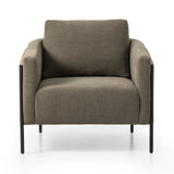 On-trend and expertly tailored, a texture-driven chair is upholstered in an olive flax/linen blend and wrapped with natural rattan, with linear iron legs finished in a complementary gunmetal Amethyst Home provides interior design, new home construction design consulting, vintage area rugs, and lighting in the Calabasas metro area.