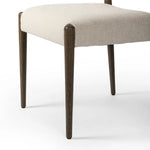 A midcentury-inspired piece, updated for modern times. A supportive back and seat cushion are upholstered in high-performance fabric, with a walnut-finished frame for a contrast of color. Steam regularly to keep fabric looking crisp. Amethyst Home provides interior design, new home construction design consulting, vintage area rugs, and lighting in the Newport Beach metro area.