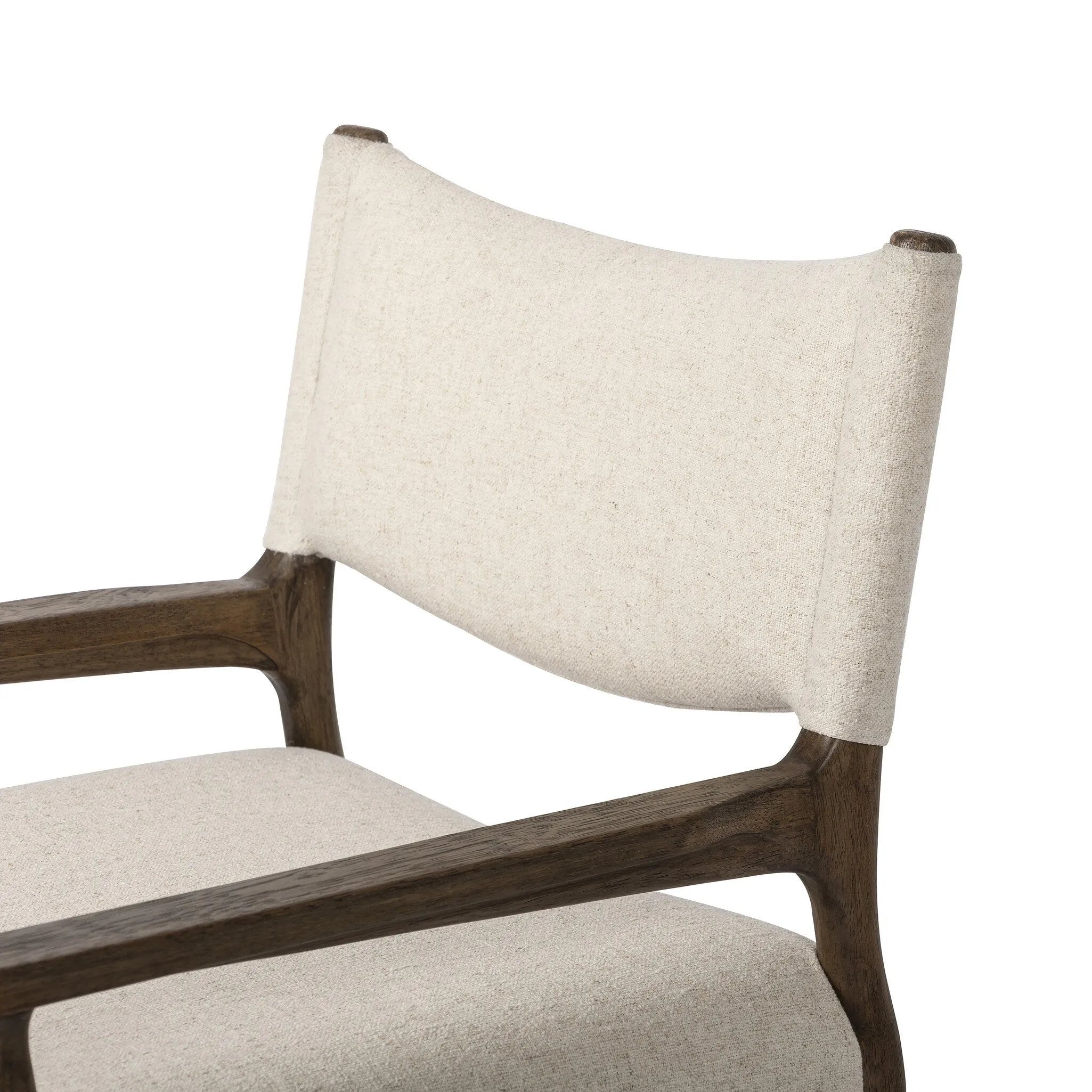 A midcentury-inspired piece, updated for modern times. A supportive back and seat cushion are upholstered in high-performance fabric, with walnut-finished wooden armrests prime for the head of the table. Steam regularly to keep fabric looking crisp. Amethyst Home provides interior design, new home construction design consulting, vintage area rugs, and lighting in the Dallas metro area.