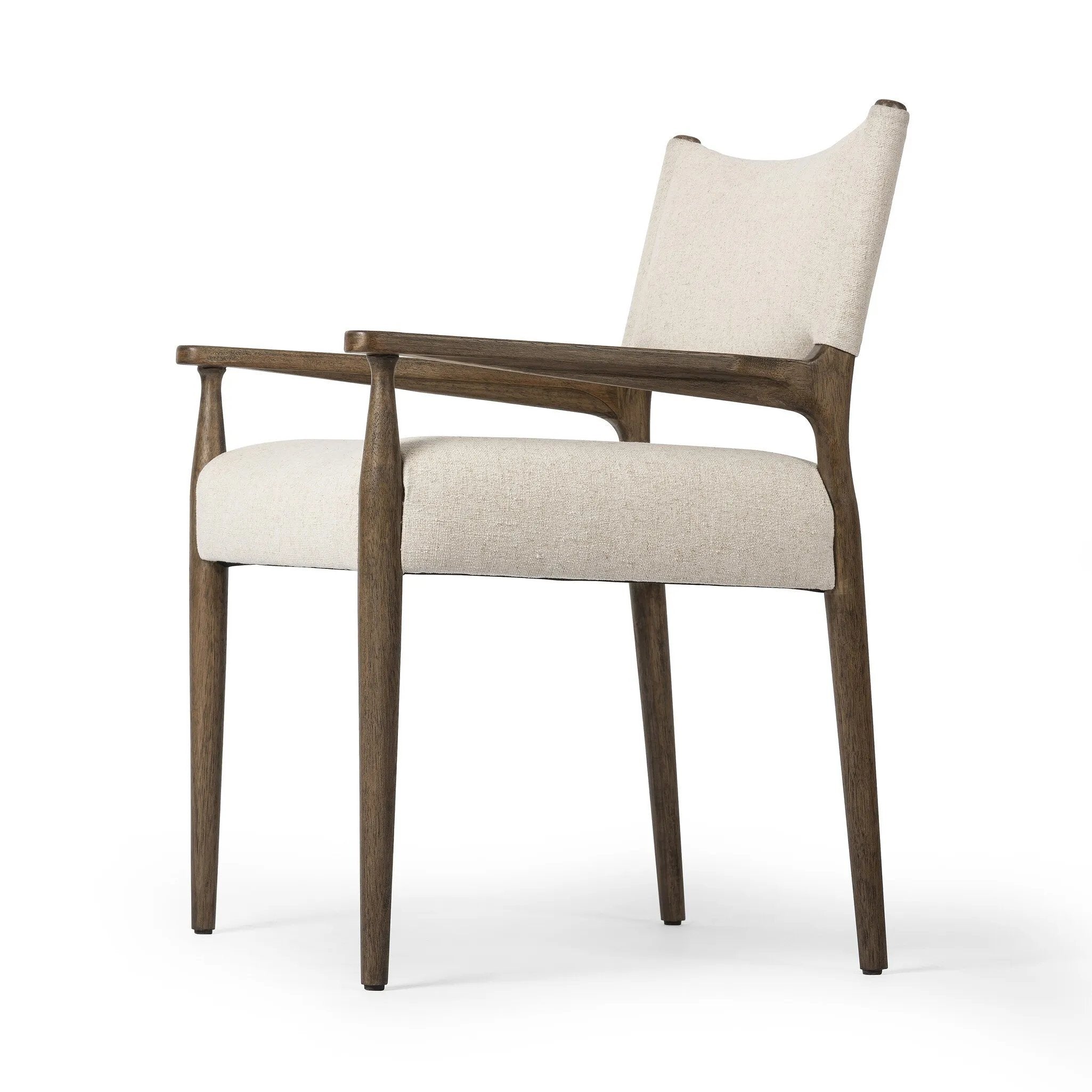 A midcentury-inspired piece, updated for modern times. A supportive back and seat cushion are upholstered in high-performance fabric, with walnut-finished wooden armrests prime for the head of the table. Steam regularly to keep fabric looking crisp. Amethyst Home provides interior design, new home construction design consulting, vintage area rugs, and lighting in the Portland metro area.