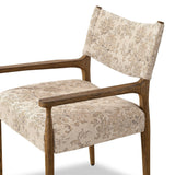 A midcentury-inspired piece brought to modern speed. A supportive, sling-style back and seat cushion are upholstered in a soft, velvety fabric, with toasted oak arms prime for the head of the table Amethyst Home provides interior design, new home construction design consulting, vintage area rugs, and lighting in the Charlotte metro area.