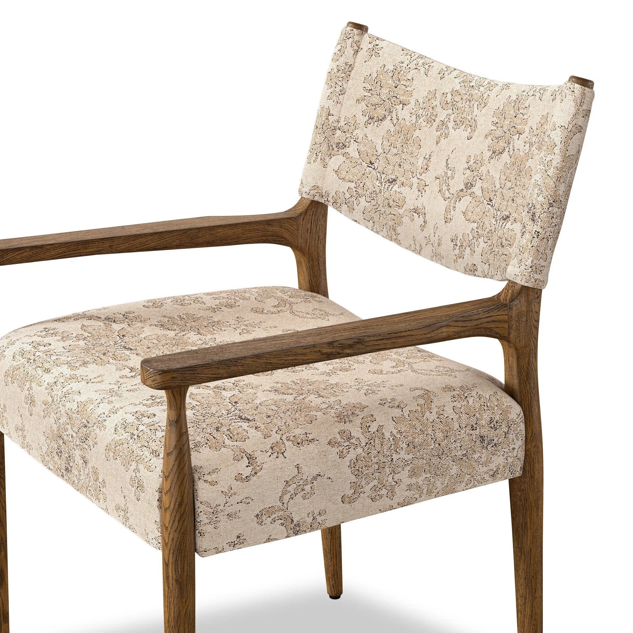 A midcentury-inspired piece brought to modern speed. A supportive, sling-style back and seat cushion are upholstered in a soft, velvety fabric, with toasted oak arms prime for the head of the table Amethyst Home provides interior design, new home construction design consulting, vintage area rugs, and lighting in the Charlotte metro area.