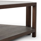 Featuring Jenzen Tempered Glass Coffee Table by Four Hands at Amethyst Home. Mix materials for a timeless look. Warm, brown oak shapes a unique octagon frame for a tempered glass top. Lower open shelving brings bonus storage and display options to your living space. Overall Dimensions: 48.00"w x 48.00"d x 16.50"h. Amethyst Home provides interior design, new home construction design consulting, vintage area rugs, and lighting in the San Diego metro area.
