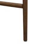 Bring a mixed-material look to the counter. Brown-finished solid oak shapes a curved seat back and sturdy frame for comfy seating upholstered with top-grain leather exclusive to Four Hands. A "handle" opening at the top of the seat back brings a touch of lightness to the look. Amethyst Home provides interior design, new home construction design consulting, vintage area rugs, and lighting in the Omaha metro area.