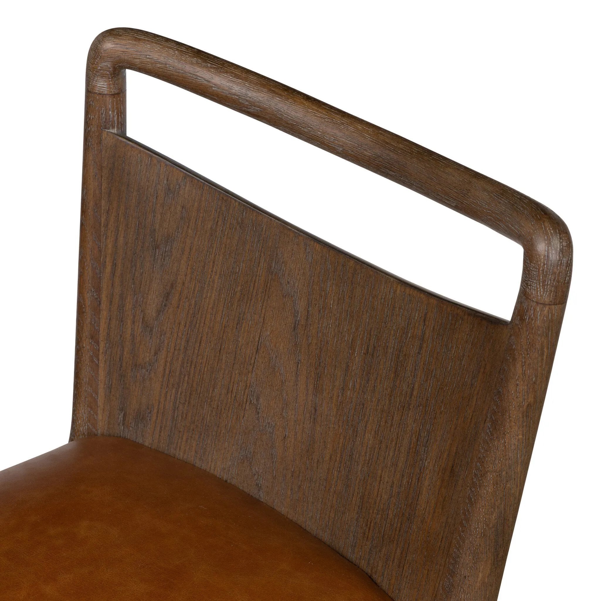 Bring a mixed-material look to the counter. Brown-finished solid oak shapes a curved seat back and sturdy frame for comfy seating upholstered with top-grain leather exclusive to Four Hands. A "handle" opening at the top of the seat back brings a touch of lightness to the look. Amethyst Home provides interior design, new home construction design consulting, vintage area rugs, and lighting in the Salt Lake City metro area.
