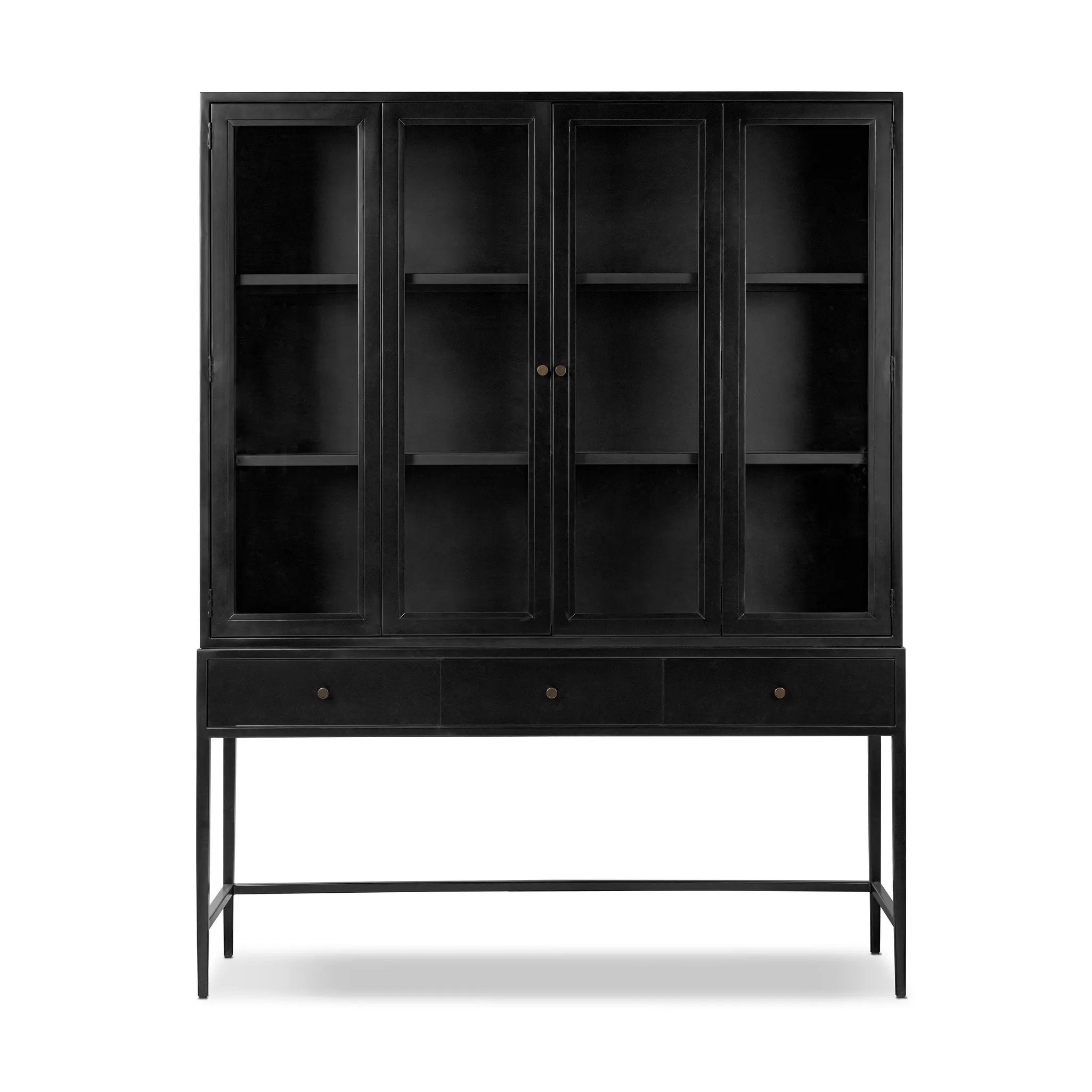 Storage-driven cabinetry inspired by angular geometry. Rich with monochromatic presence, a black-finished metal cabinet pairs with an airy iron base for a balance in scale. Three drawers bring even more storage, with bi-fold glass doors for display options. Minimalist bronzed hardware completes the look Amethyst Home provides interior design, new home construction design consulting, vintage area rugs, and lighting in the Portland metro area.