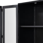 Featuring Jimi Black Cabinet by Four Hands at Amethyst Home. Storage-driven cabinetry inspired by angular geometry. Rich with monochromatic presence, a black-finished metal cabinet pairs with an airy iron base for a balance in scale. Three drawers bring even more storage, with bi-fold glass doors for display options. Minimalist bronzed hardware completes the . Amethyst Home provides interior design, new home construction design consulting, vintage area rugs, and lighting in the Seattle metro area.