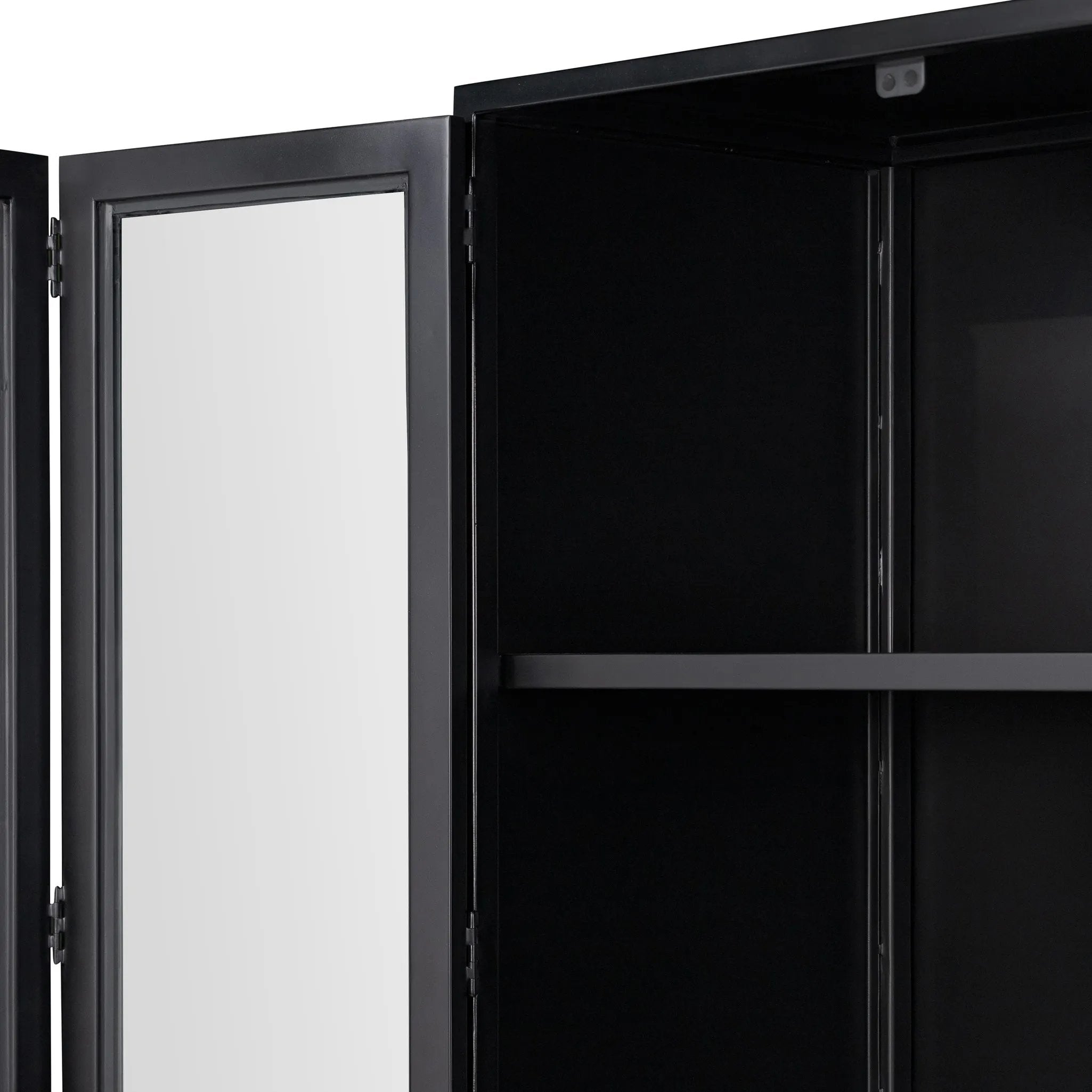 Featuring Jimi Black Cabinet by Four Hands at Amethyst Home. Storage-driven cabinetry inspired by angular geometry. Rich with monochromatic presence, a black-finished metal cabinet pairs with an airy iron base for a balance in scale. Three drawers bring even more storage, with bi-fold glass doors for display options. Minimalist bronzed hardware completes the . Amethyst Home provides interior design, new home construction design consulting, vintage area rugs, and lighting in the Seattle metro area.
