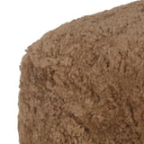 Small scale, big personality. This petite, shearling ottoman pairs a rounded upholstered seat with rugged, hammered black feet for a hand-crafted look.As lovers of modern materials at Amethyst, we love the nature inspired Joey Ottoman - Amber Shearling. This item pairs well with other brands such as Loloi Rugs and is perfect for coastal homes Amethyst Home provides interior design, new home construction design consulting, vintage area rugs, and lighting in the Monterey metro area.