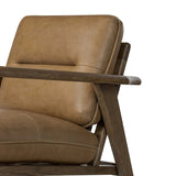 Featuring Jones Palermo Drift Chair by Four Hands at Amethyst Home. A coastal-inspired lounge chair, modernized. Angled back legs and separate cushioning create a relaxed, inviting look. Mid-level blind stitching refines the seat back. Stark amber ash frame offsets rich top-grain leather, showcasing thick-cut hide with pronounced natural texture.Overall Dim. Amethyst Home provides interior design, new home construction design consulting, vintage area rugs, and lighting in the Nashville metro area.