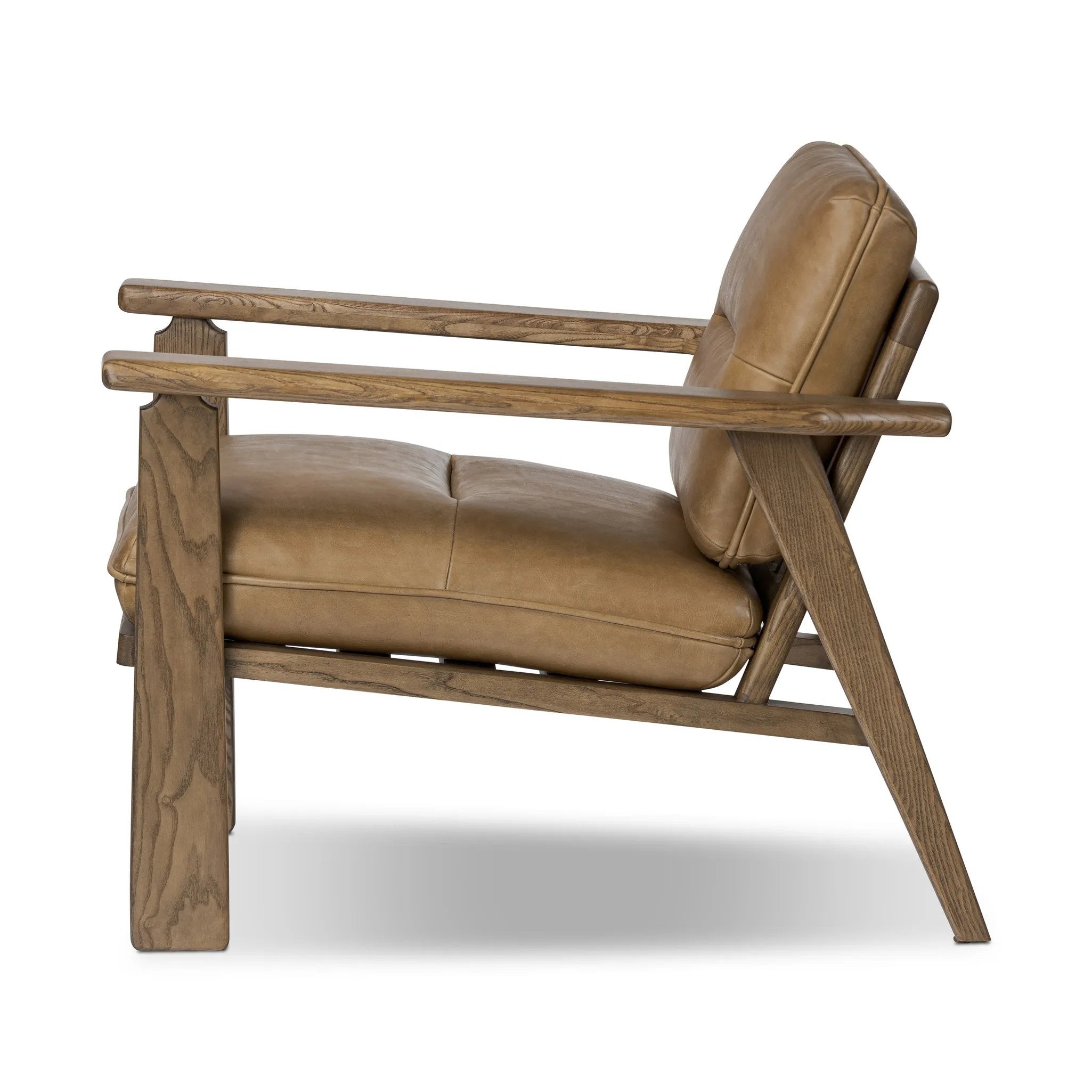 Featuring Jones Palermo Drift Chair by Four Hands at Amethyst Home. A coastal-inspired lounge chair, modernized. Angled back legs and separate cushioning create a relaxed, inviting look. Mid-level blind stitching refines the seat back. Stark amber ash frame offsets rich top-grain leather, showcasing thick-cut hide with pronounced natural texture.Overall. Amethyst Home provides interior design, new home construction design consulting, vintage area rugs, and lighting in the Newport Beach metro area.