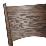 Featuring Jovan Stained Saddle Brown Dining Chair by Four Hands at Amethyst Home. A seamless addition to your dining collection, a slim-profile dining chair pairs a woven banana leaf seat with a solid oak frame featuring a bentwood back. Overall Dimensions: 20.00"w x 22.25"d x 37.00"h. Amethyst Home provides interior design, new home construction design consulting, vintage area rugs, and lighting in the Portland metro area.