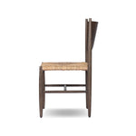 Featuring Jovan Stained Saddle Brown Dining Chair by Four Hands at Amethyst Home. A seamless addition to your dining collection, a slim-profile dining chair pairs a woven banana leaf seat with a solid oak frame featuring a bentwood back. Overall Dimensions: 20.00"w x 22.25"d x 37.00"h. Amethyst Home provides interior design, new home construction design consulting, vintage area rugs, and lighting in the Salt Lake City metro area.