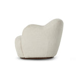 With a high, yarn-like pile that's soft to the touch, ivory upholstery pairs with an S-spring seat and enveloped frame for an inviting look and feel on this 360-degree swivel chair Amethyst Home provides interior design, new home construction design consulting, vintage area rugs, and lighting in the Miami metro area.