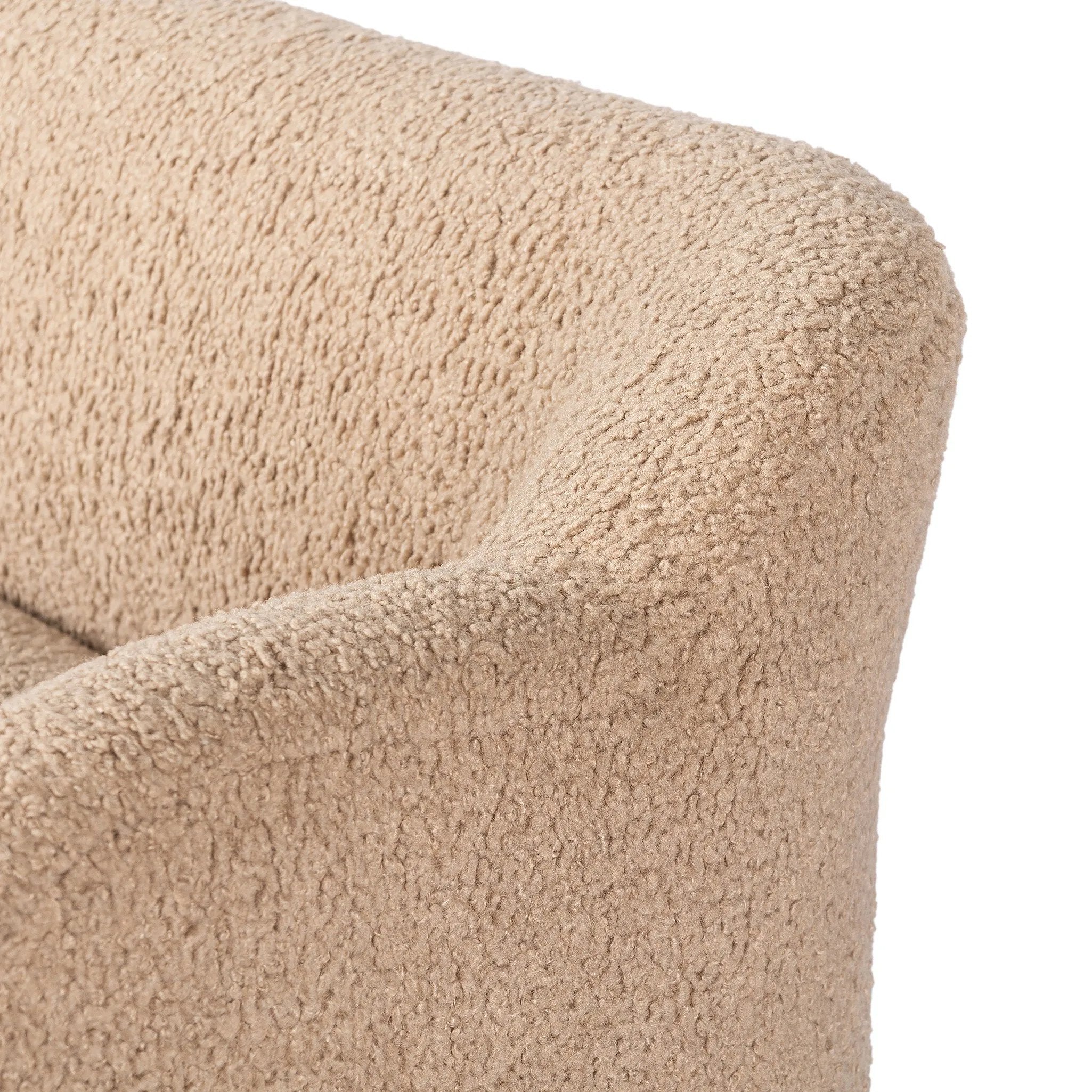 Simply classic. A high wing back pairs with softly rolled arms for a curvy look and supportive sit. Tan shearling-like upholstery invites you to settle in.As fans of natural style at Amethyst, we love the warm modern inspired Kadon Accent Bench - Sheepskin Camel. Amethyst Home provides interior design, new home construction design consulting, vintage area rugs, and lighting in the Boston metro area.