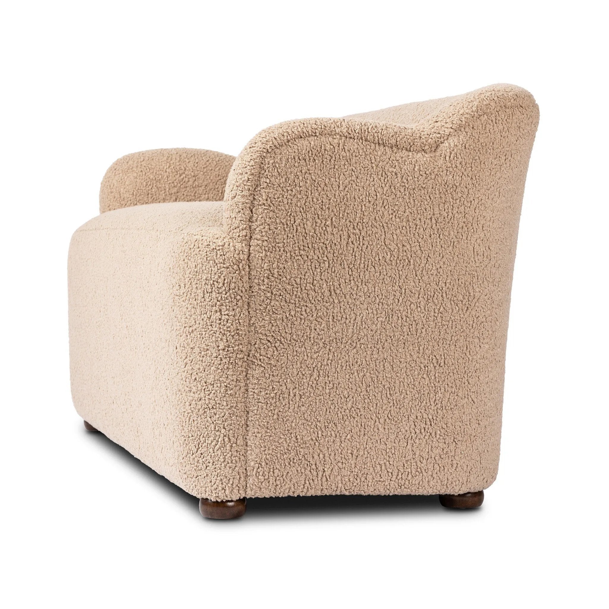 Simply classic. A high wing back pairs with softly rolled arms for a curvy look and supportive sit. Tan shearling-like upholstery invites you to settle in.As fans of natural style at Amethyst, we love the warm modern inspired Kadon Accent Bench - Sheepskin Camel. Amethyst Home provides interior design, new home construction design consulting, vintage area rugs, and lighting in the Calabasas metro area.