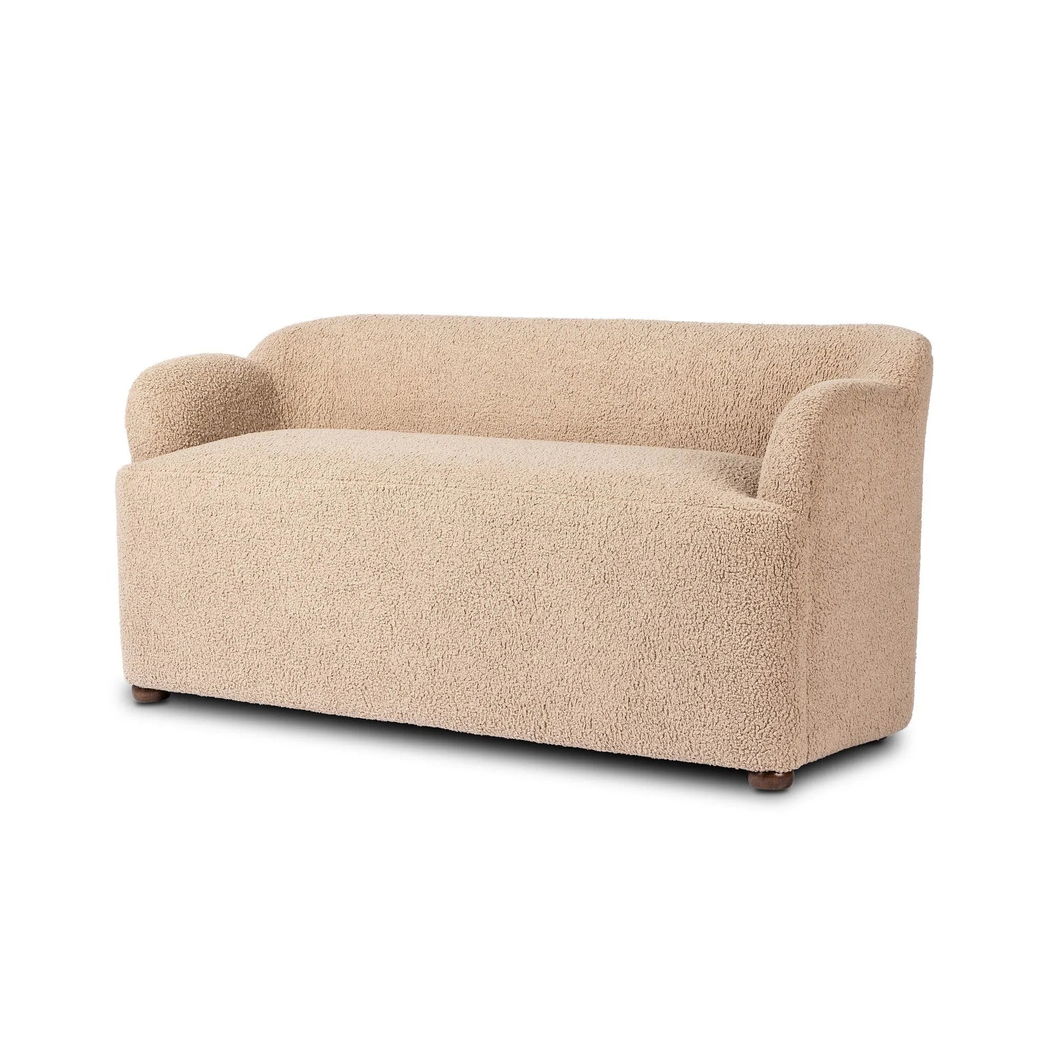 Simply classic. A high wing back pairs with softly rolled arms for a curvy look and supportive sit. Tan shearling-like upholstery invites you to settle in.As fans of natural style at Amethyst, we love the warm modern inspired Kadon Accent Bench - Sheepskin Camel. Amethyst Home provides interior design, new home construction design consulting, vintage area rugs, and lighting in the Laguna Beach metro area.