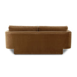 Float-style this unique sofa in a room to show off design details like sleek lines and rear cutouts. Designed with S spring construction, foam and fiber seat cushioning and loose feather-blend back cushions. Upholstered in a soft, velvety cotton in a warm ochre hue. Amethyst Home provides interior design, new home construction design consulting, vintage area rugs, and lighting in the Miami metro area.