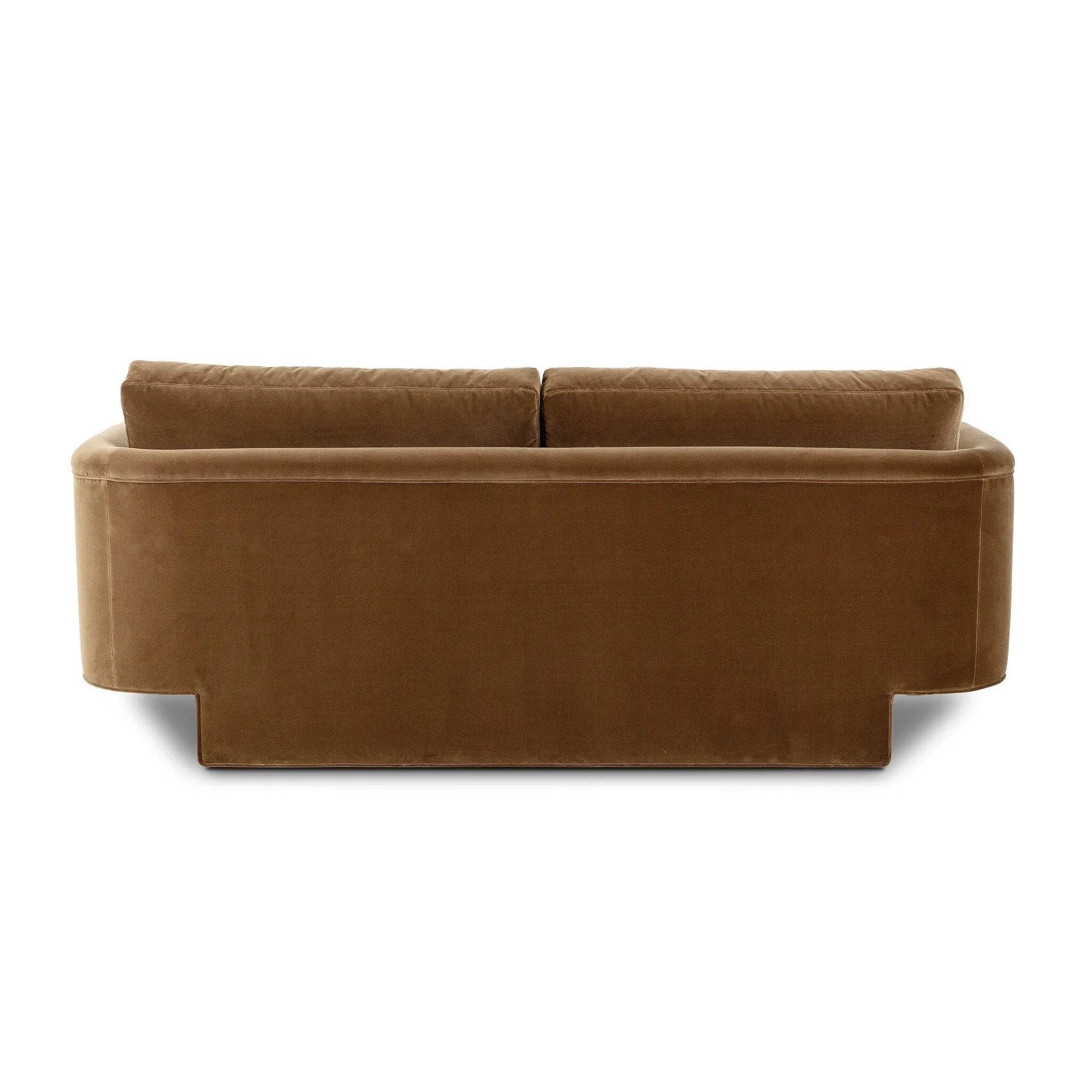 Float-style this unique sofa in a room to show off design details like sleek lines and rear cutouts. Designed with S spring construction, foam and fiber seat cushioning and loose feather-blend back cushions. Upholstered in a soft, velvety cotton in a warm ochre hue. Amethyst Home provides interior design, new home construction design consulting, vintage area rugs, and lighting in the Miami metro area.