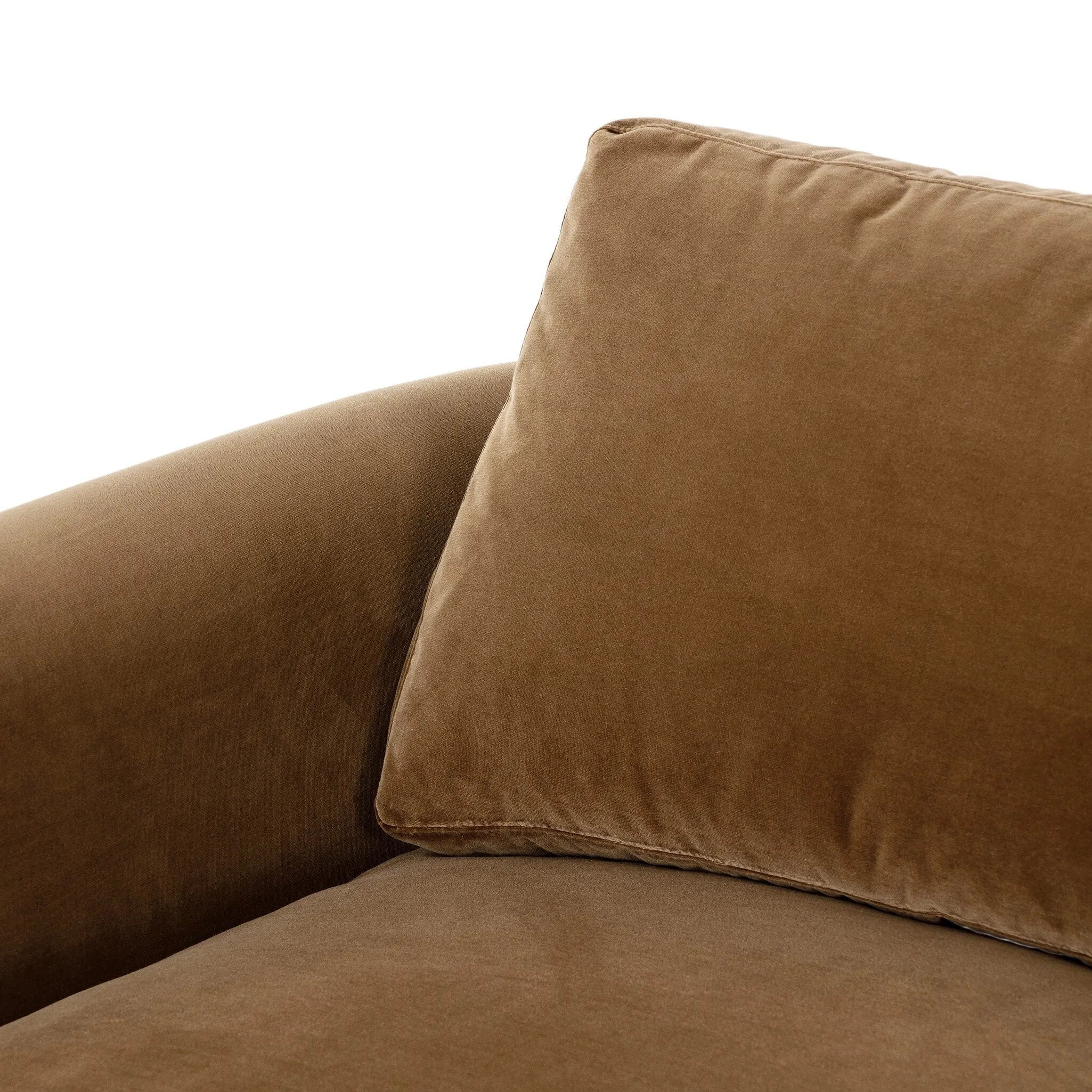 Float-style this unique sofa in a room to show off design details like sleek lines and rear cutouts. Designed with S spring construction, foam and fiber seat cushioning and loose feather-blend back cushions. Upholstered in a soft, velvety cotton in a warm ochre hue. Amethyst Home provides interior design, new home construction design consulting, vintage area rugs, and lighting in the Newport Beach metro area.