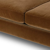 Float-style this unique sofa in a room to show off design details like sleek lines and rear cutouts. Designed with S spring construction, foam and fiber seat cushioning and loose feather-blend back cushions. Upholstered in a soft, velvety cotton in a warm ochre hue. Amethyst Home provides interior design, new home construction design consulting, vintage area rugs, and lighting in the Salt Lake City metro area.