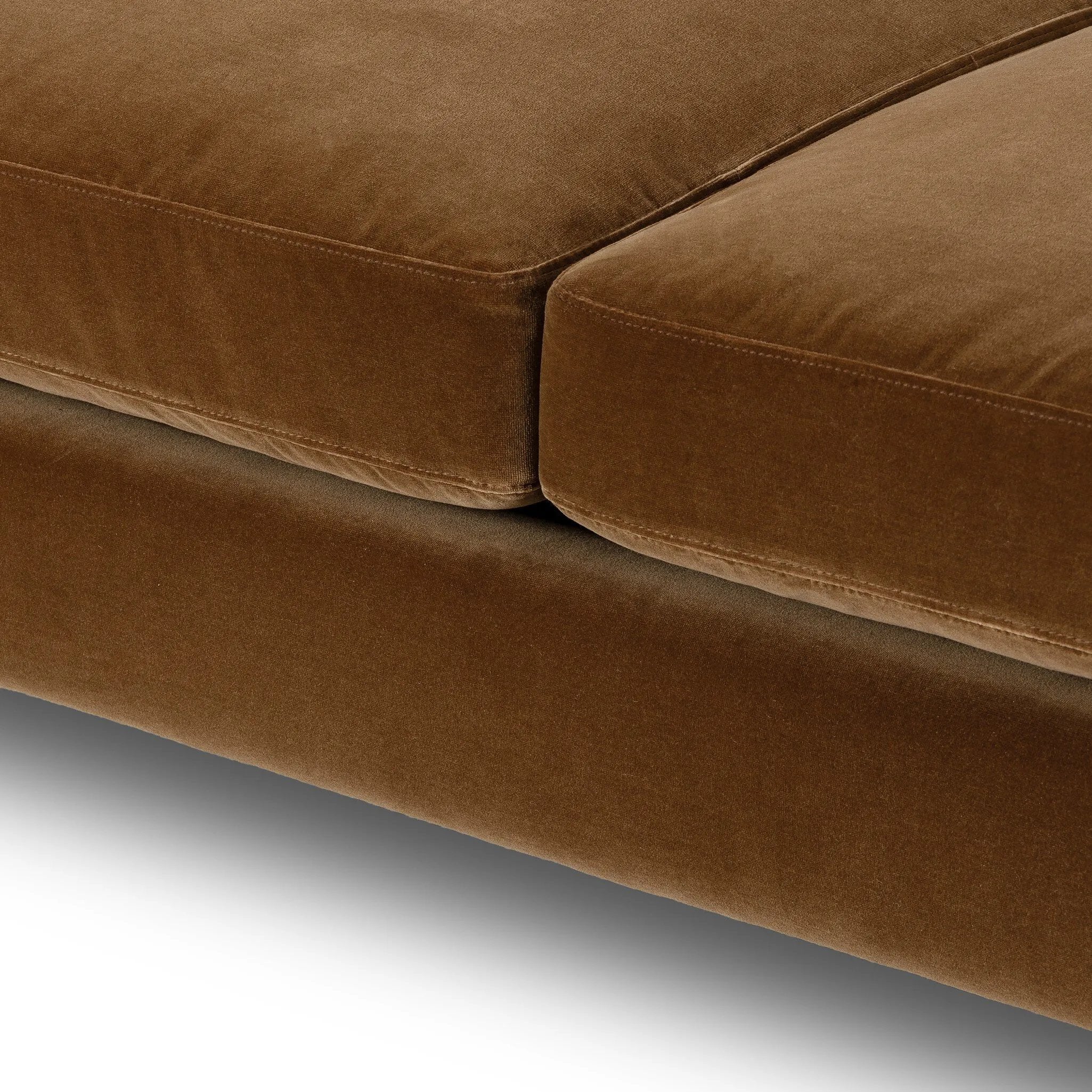 Float-style this unique sofa in a room to show off design details like sleek lines and rear cutouts. Designed with S spring construction, foam and fiber seat cushioning and loose feather-blend back cushions. Upholstered in a soft, velvety cotton in a warm ochre hue. Amethyst Home provides interior design, new home construction design consulting, vintage area rugs, and lighting in the Salt Lake City metro area.