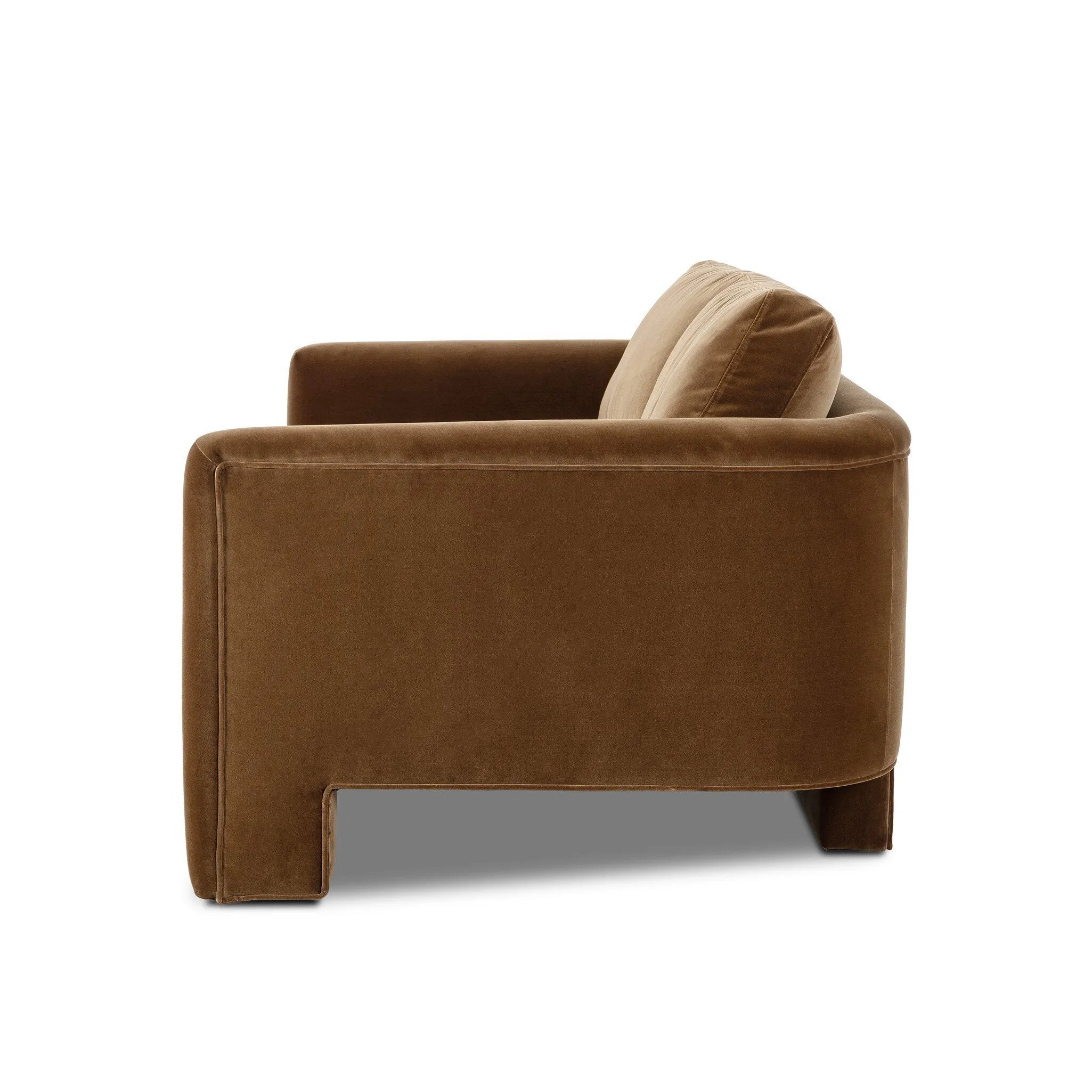 Float-style this unique sofa in a room to show off design details like sleek lines and rear cutouts. Designed with S spring construction, foam and fiber seat cushioning and loose feather-blend back cushions. Upholstered in a soft, velvety cotton in a warm ochre hue. Amethyst Home provides interior design, new home construction design consulting, vintage area rugs, and lighting in the San Diego metro area.