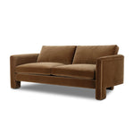 Float-style this unique sofa in a room to show off design details like sleek lines and rear cutouts. Designed with S spring construction, foam and fiber seat cushioning and loose feather-blend back cushions. Upholstered in a soft, velvety cotton in a warm ochre hue. Amethyst Home provides interior design, new home construction design consulting, vintage area rugs, and lighting in the Washington metro area.