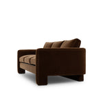 Float-style this unique sofa in a room to show off design details like sleek lines and rear cutouts. Designed with S spring construction, foam and fiber seat cushioning and loose feather-blend back cushions. Upholstered in a soft, velvety cotton in a rich chocolate brown Amethyst Home provides interior design, new home construction design consulting, vintage area rugs, and lighting in the Alpharetta metro area.