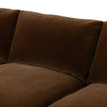 Float-style this unique sofa in a room to show off design details like sleek lines and rear cutouts. Designed with S spring construction, foam and fiber seat cushioning and loose feather-blend back cushions. Upholstered in a soft, velvety cotton in a rich chocolate brown Amethyst Home provides interior design, new home construction design consulting, vintage area rugs, and lighting in the Calabasas metro area.